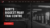 The GFC Muay Thai homepage, showing a full-width photo of the gym's heavy bags behind the headline "Bury's biggest Muay Thai centre" and a "View the timetable" button